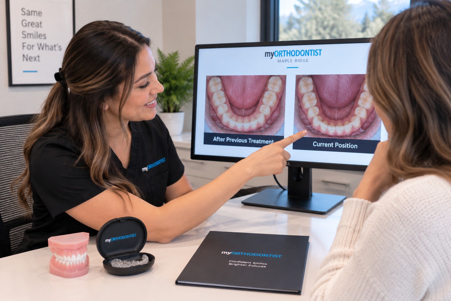 Adult patient reviewing orthodontic treatment options with an orthodontic team member