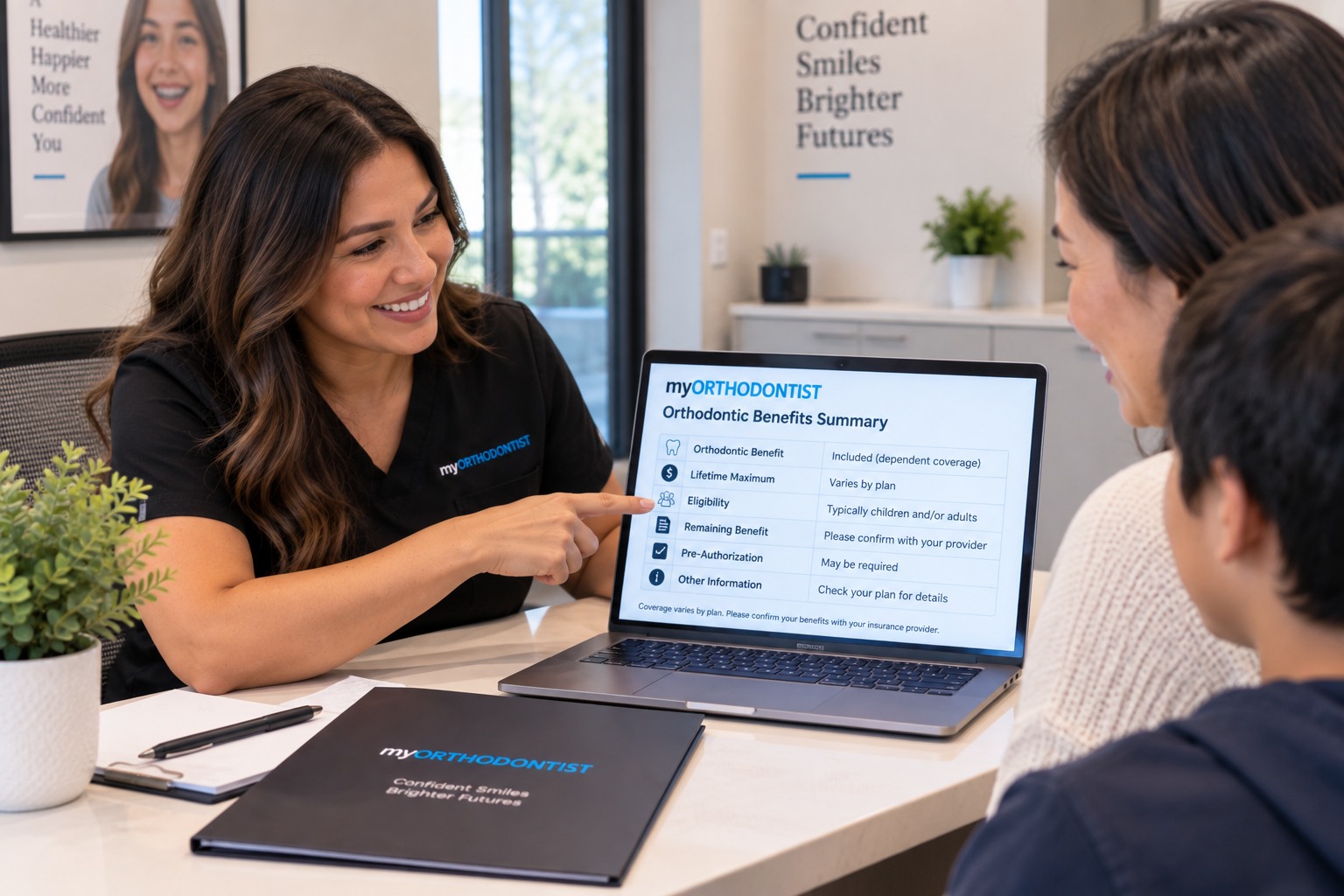 Patient reviewing orthodontic insurance benefits with a treatment coordinator in Maple Ridge