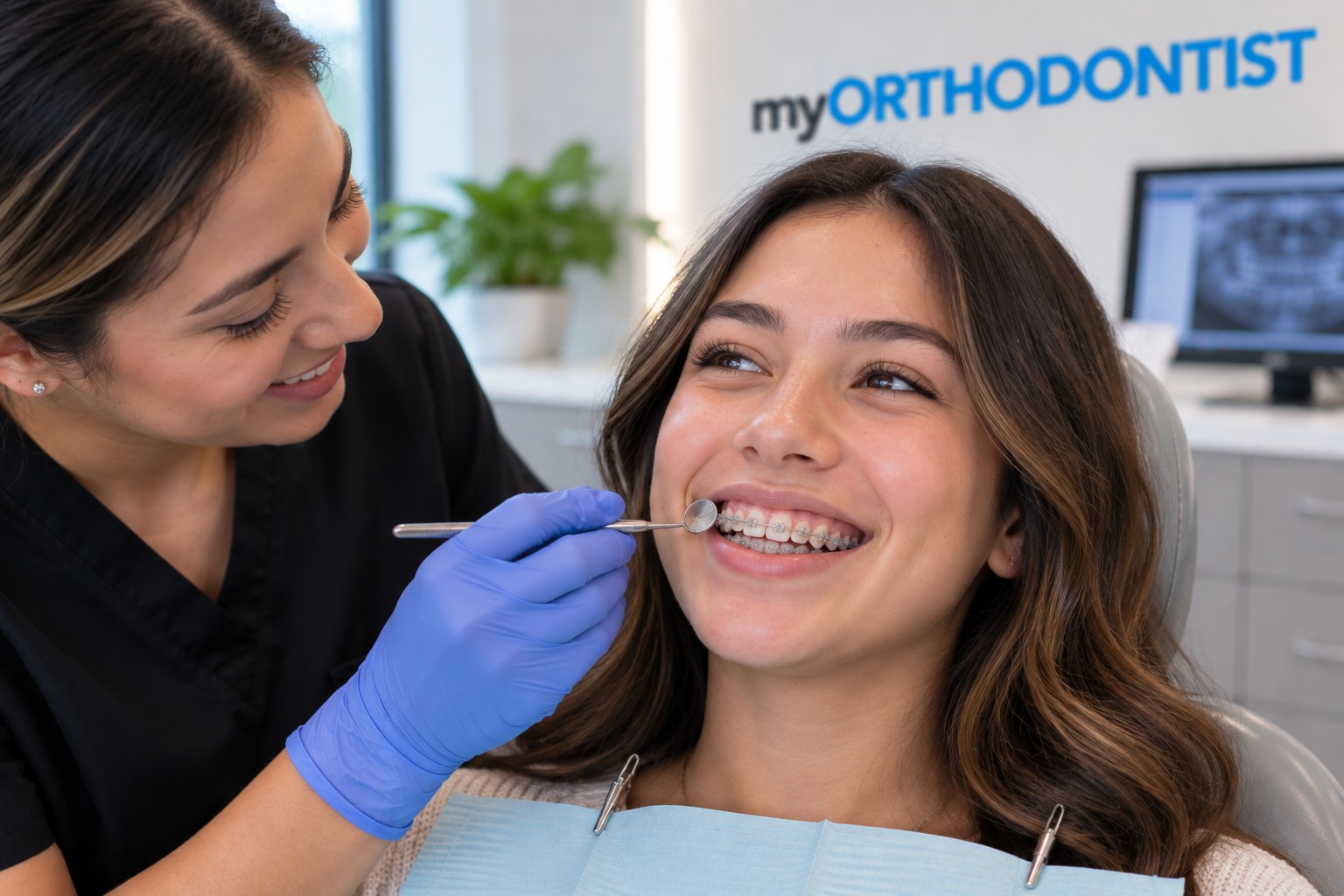 Young adult wearing tooth-coloured ceramic braces during orthodontic treatment in Maple Ridge